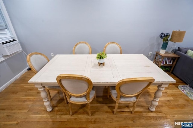 95 Mount Prospect Ave, Newark, NJ 07104 - dining room featuring wood finished floors and cooling unit