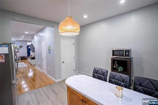 95 Mount Prospect Ave, Newark, NJ 07104 - office featuring light wood finished floors, recessed lighting, and a baseboard heating unit
