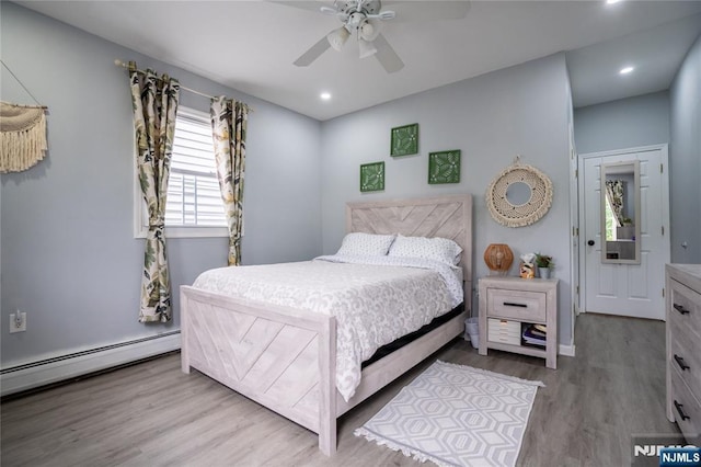 95 Mount Prospect Ave, Newark, NJ 07104 - bedroom featuring baseboard heating, wood finished floors, recessed lighting, and ceiling fan