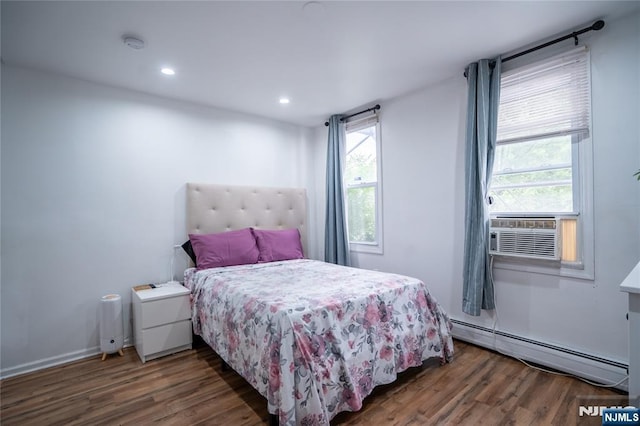 95 Mount Prospect Ave, Newark, NJ 07104 - bedroom featuring a baseboard radiator, wood finished floors, cooling unit, and recessed lighting