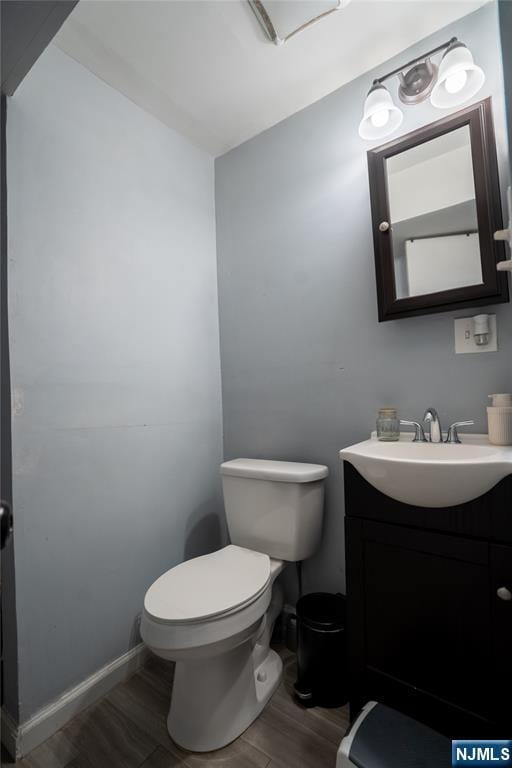 95 Mount Prospect Ave, Newark, NJ 07104 - half bath featuring wood finished floors and vanity