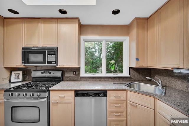 0-04 Pine Ave, Fair Lawn, NJ 07410 - kitchen featuring stainless steel appliances, light brown cabinets, tasteful backsplash, and light stone counters