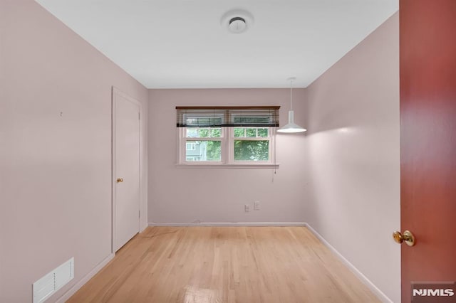 0-04 Pine Ave, Fair Lawn, NJ 07410 - unfurnished bedroom featuring wood finished floors