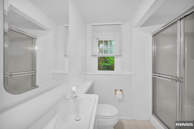0-04 Pine Ave, Fair Lawn, NJ 07410 - bathroom featuring a shower stall, tile patterned floors, and vanity