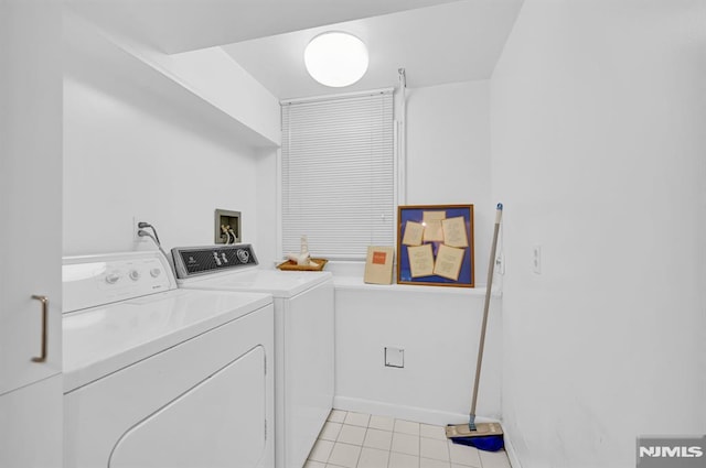 0-04 Pine Ave, Fair Lawn, NJ 07410 - washroom with washing machine and clothes dryer and light tile patterned floors