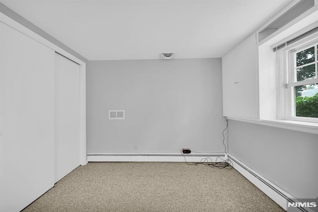 0-04 Pine Ave, Fair Lawn, NJ 07410 - unfurnished bedroom with light carpet, a closet, and baseboard heating