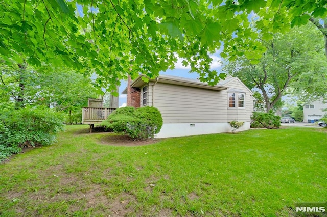 0-04 Pine Ave, Fair Lawn, NJ 07410 - view of side of property with a lawn, a deck, and crawl space