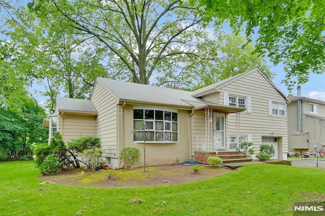0-04 Pine Ave, Fair Lawn, NJ 07410 - split level home featuring a front lawn