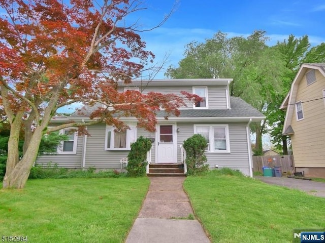 35 3rd Ave, Little Falls, NJ 07424 - view of front of home with a shingled roof