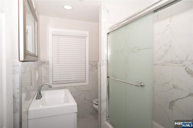 35 3rd Ave, Little Falls, NJ 07424 - full bath with tile walls, vanity, and a stall shower