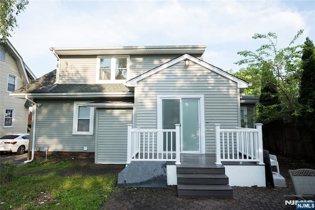 35 3rd Ave, Little Falls, NJ 07424 - rear view of property featuring roof with shingles
