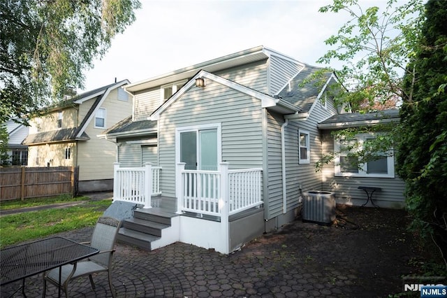 35 3rd Ave, Little Falls, NJ 07424 - rear view of house with a patio area