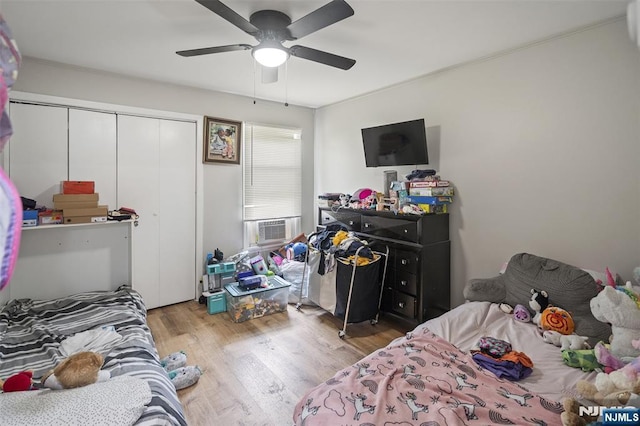 188 Park St, East Orange, NJ 07017 - bedroom featuring a closet, wood finished floors, and ceiling fan