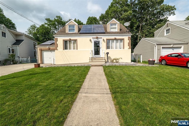 72 N Dr, Rochelle Park, NJ 07662 - new england style home featuring entry steps, solar panels, stucco siding, concrete driveway, and roof with shingles