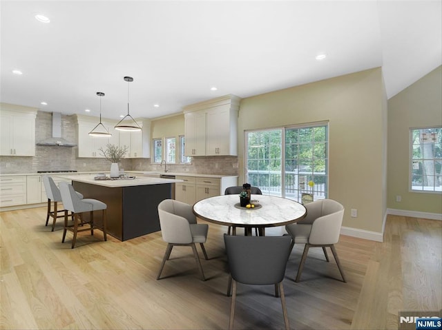 345 Creek Bed Rd, Mountainside, NJ 07092 - dining area with light wood-style flooring and recessed lighting