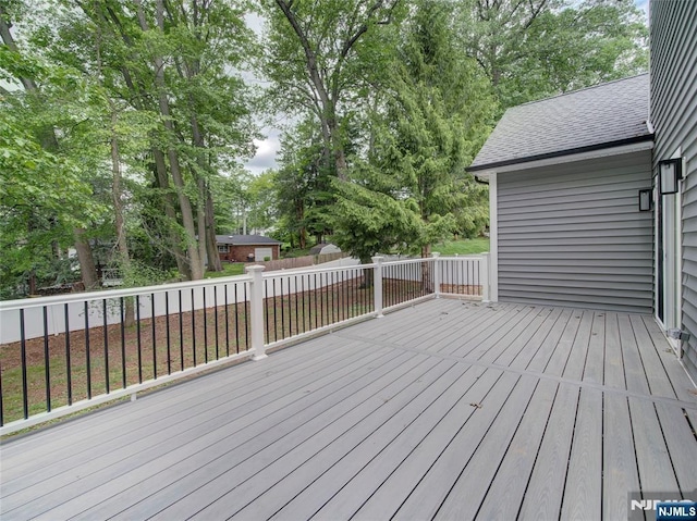 345 Creek Bed Rd, Mountainside, NJ 07092 - wooden terrace featuring view of scattered trees