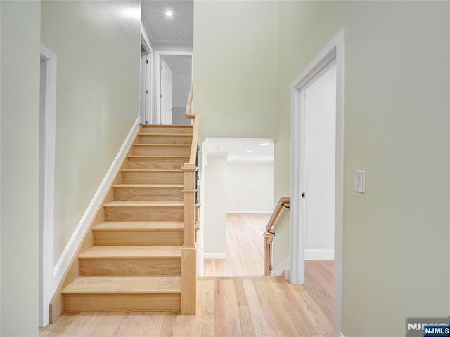 345 Creek Bed Rd, Mountainside, NJ 07092 - stairs with wood finished floors and recessed lighting