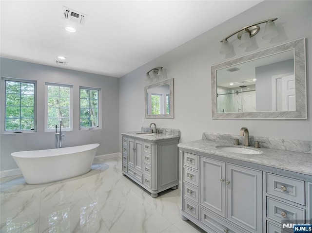 345 Creek Bed Rd, Mountainside, NJ 07092 - bathroom with two vanities, marble look tiles, a soaking tub, a shower, and recessed lighting