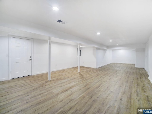 345 Creek Bed Rd, Mountainside, NJ 07092 - finished below grade area featuring wood finished floors and recessed lighting