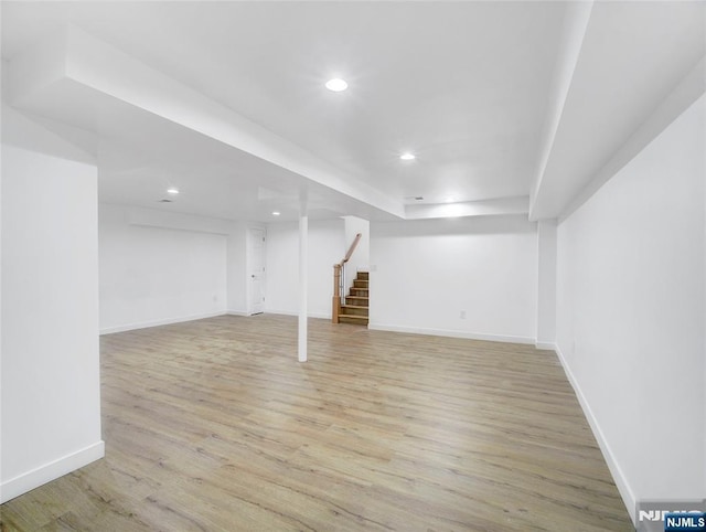 345 Creek Bed Rd, Mountainside, NJ 07092 - finished below grade area with stairway, light wood finished floors, and recessed lighting