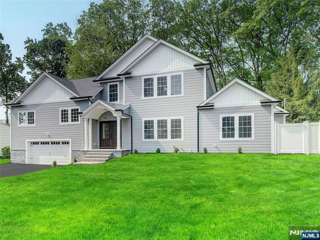 345 Creek Bed Rd, Mountainside, NJ 07092 - view of front of property featuring board and batten siding, an attached garage, and asphalt driveway