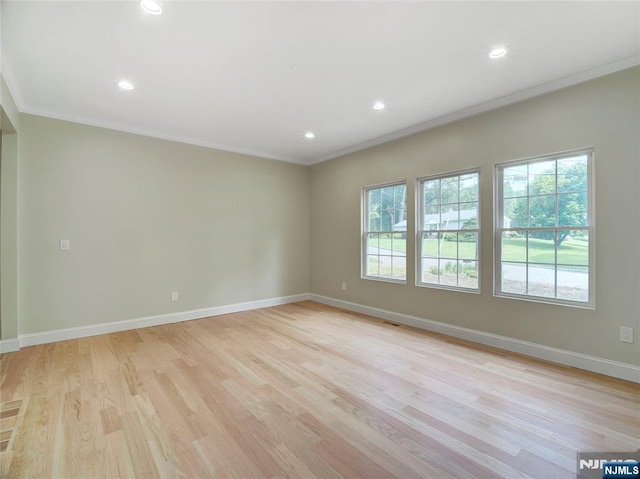 345 Creek Bed Rd, Mountainside, NJ 07092 - empty room featuring plenty of natural light, crown molding, light wood-style flooring, and recessed lighting