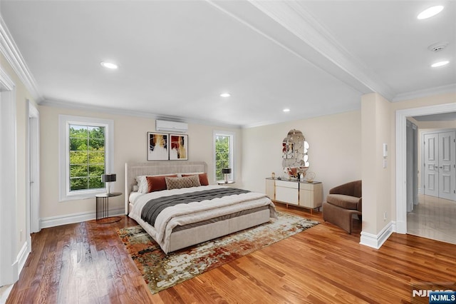 82 Jackson Dr, Cresskill, NJ 07626 - bedroom featuring a wall mounted AC, ornamental molding, multiple windows, wood finished floors, and recessed lighting