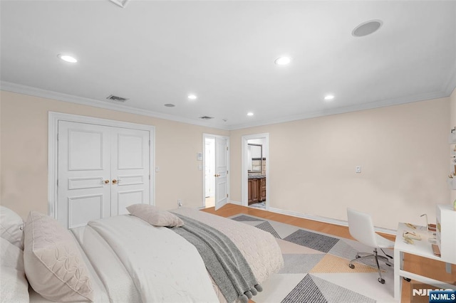 82 Jackson Dr, Cresskill, NJ 07626 - bedroom with recessed lighting, light wood-style flooring, crown molding, and a closet