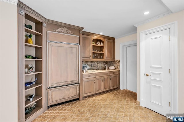 82 Jackson Dr, Cresskill, NJ 07626 - bar area with tasteful backsplash, recessed lighting, and crown molding