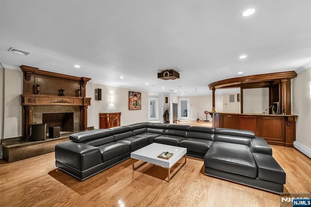 82 Jackson Dr, Cresskill, NJ 07626 - living area featuring ornamental molding, light wood-type flooring, recessed lighting, and a high end fireplace