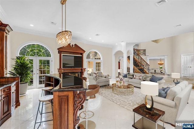 82 Jackson Dr, Cresskill, NJ 07626 - living area featuring a chandelier, french doors, stairway, crown molding, and light tile patterned floors