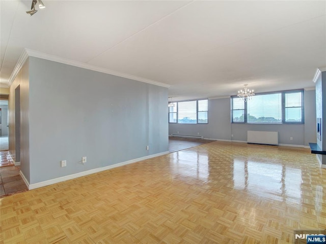 250 Gorge Rd Unit 16D, Cliffside Park, NJ 07010 - spare room featuring ornamental molding, baseboard heating, and a chandelier
