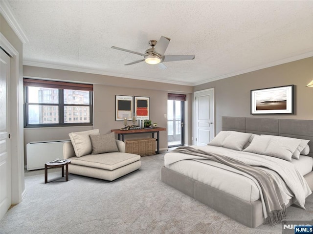 250 Gorge Rd Unit 16D, Cliffside Park, NJ 07010 - carpeted bedroom with a textured ceiling, ornamental molding, and a ceiling fan
