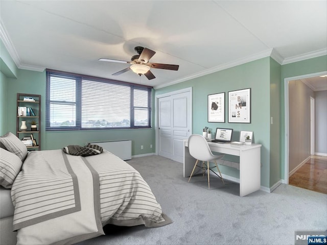 250 Gorge Rd Unit 16D, Cliffside Park, NJ 07010 - bedroom with crown molding, light carpet, an office area, a closet, and a ceiling fan