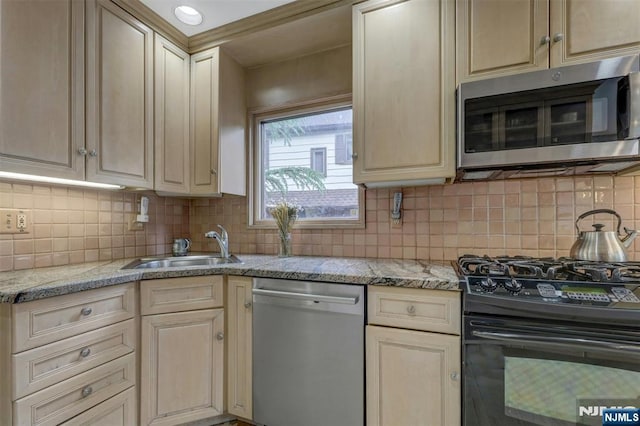 548 Standish Rd, Teaneck, NJ 07666 - kitchen with stainless steel appliances, tasteful backsplash, and light stone countertops