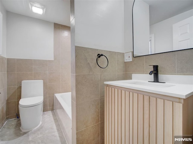112-122 Halsted, Newark, NJ 07106 - full bathroom featuring tile walls, a bath, and vanity