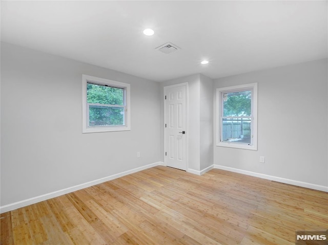112-122 Halsted, Newark, NJ 07106 - unfurnished bedroom with multiple windows, recessed lighting, and light wood-style flooring