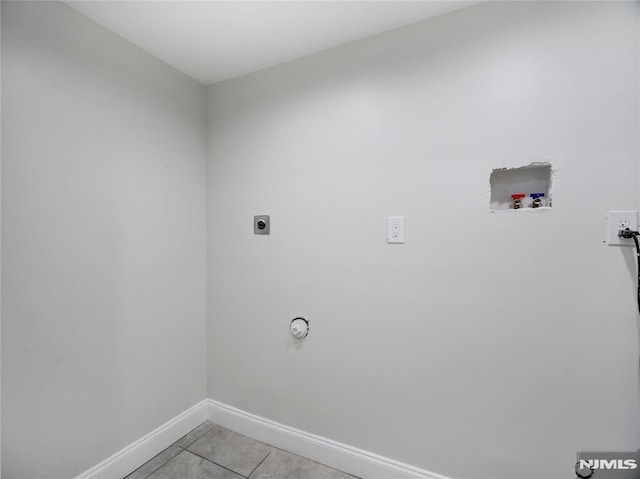 112-122 Halsted, Newark, NJ 07106 - washroom with hookup for a washing machine, electric dryer hookup, and light tile patterned floors