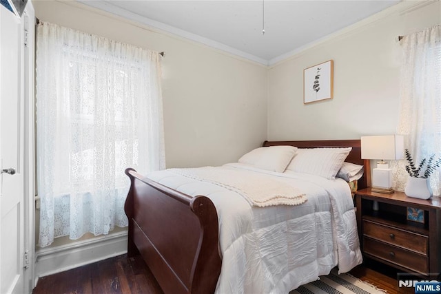 19 Mckinley Ave, West Orange, NJ 07052 - bedroom with crown molding and wood finished floors