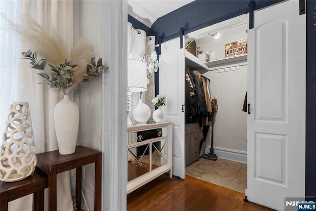 19 Mckinley Ave, West Orange, NJ 07052 - spacious closet with wood finished floors and a barn door