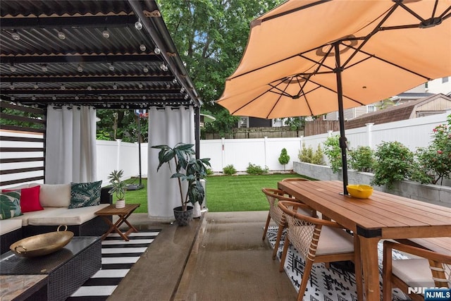 19 Mckinley Ave, West Orange, NJ 07052 - fenced backyard with a patio area, outdoor dining area, and outdoor lounge area