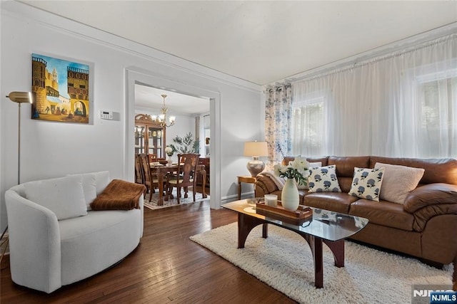 19 Mckinley Ave, West Orange, NJ 07052 - living room featuring a chandelier, ornamental molding, and hardwood / wood-style flooring