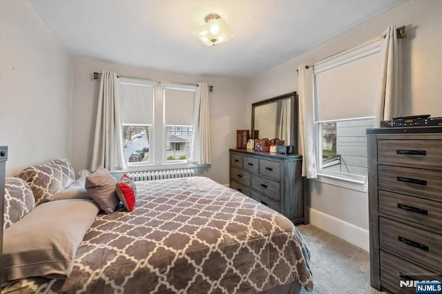 460 River Rd, Bogota, NJ 07603 - carpeted bedroom featuring radiator and baseboards
