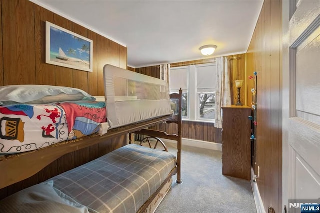 460 River Rd, Bogota, NJ 07603 - carpeted bedroom featuring wood walls