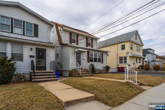 21 Witherspoon St, Nutley, NJ 07110 - view of front of property with entry steps and a front lawn