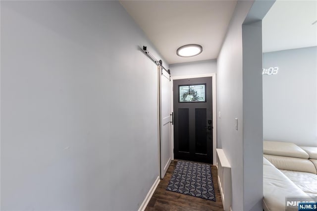 333 Kinderkamack Rd, River Edge, NJ 07661 - doorway with dark wood finished floors and a barn door