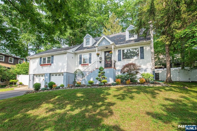 40 Lake Dr, Wayne, NJ 07470 - new england style home featuring an attached garage and asphalt driveway