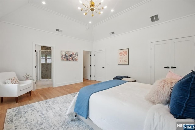 44 N Ashby Ave, Livingston, NJ 07039 - bedroom with a chandelier, wood finished floors, crown molding, recessed lighting, and connected bathroom