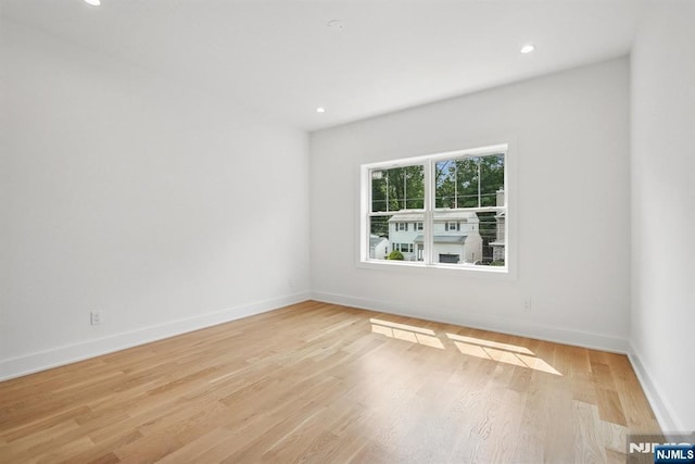 44 N Ashby Ave, Livingston, NJ 07039 - empty room featuring light wood-style floors and recessed lighting