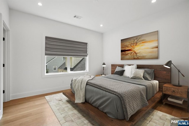 44 N Ashby Ave, Livingston, NJ 07039 - bedroom with light wood-style flooring and recessed lighting